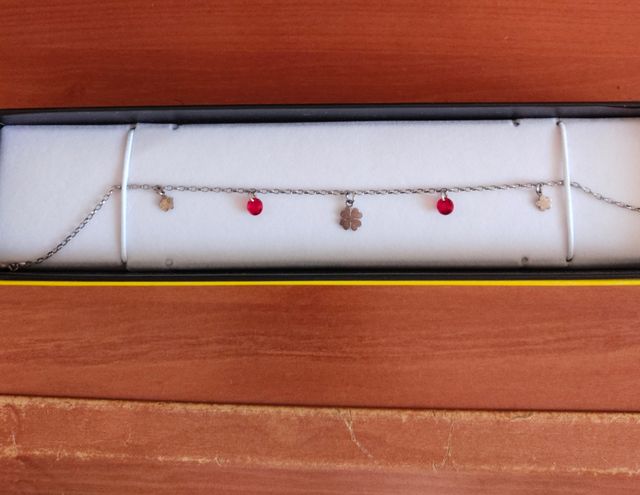 Tobillera plata con trébol