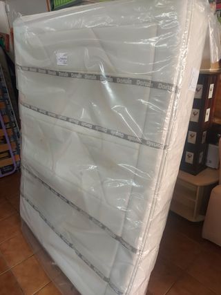 Colchón 150x190 seminuevo con trasnporte incluido.