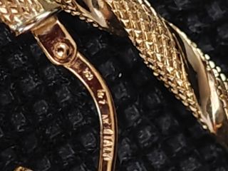 Pendientes oro 18k ovalados rizados051-04-00340