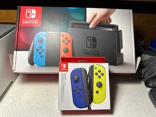 Nintendo Switch + Joy-Con gialli e blu
