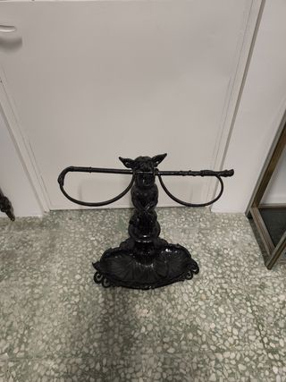 Paragüero antiguo perro