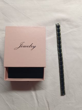 Pulsera magnética negra y dorada