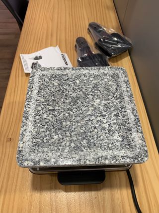 Plancha eléctrica de piedra
Nueva