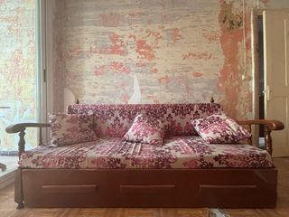 Sofá-cama antiguo de madera
