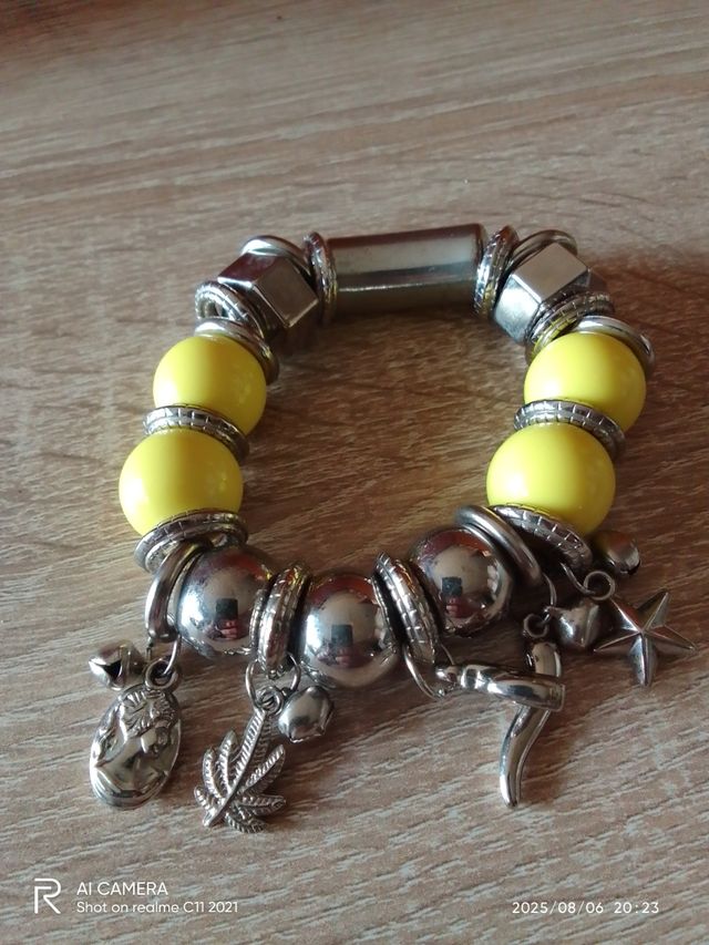 Pulsera bisutería amarilla plata