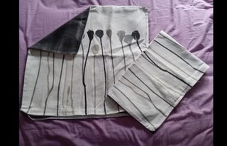 Fundas cojines grises y blancas