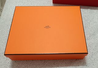 Scatola e borse Hermès, Valentino, Dolce e Gabbana