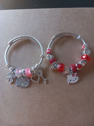 Pulseras Hello Kitty rojas y rosas