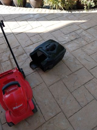 Cortacésped rojo usado