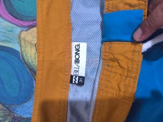 Bañador azul y naranja talla 31