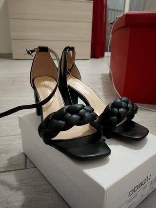 Sandali neri Obsel intrecciati