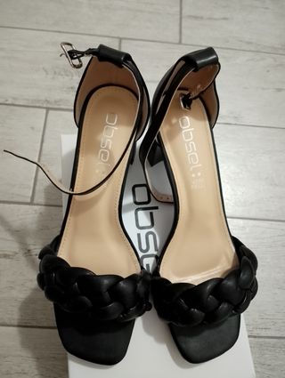 Sandali neri Obsel intrecciati