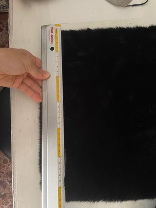 Mini borsa a mano nera in pelliccia sintetica