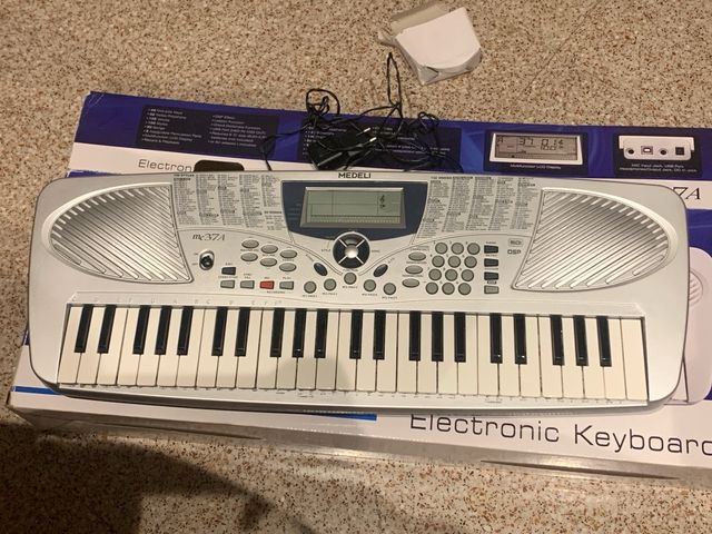 Teclado Electrónico mc37A - 49 teclas