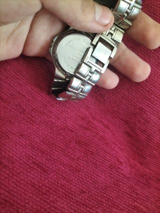 Reloj cuarzo dorado y plateado
