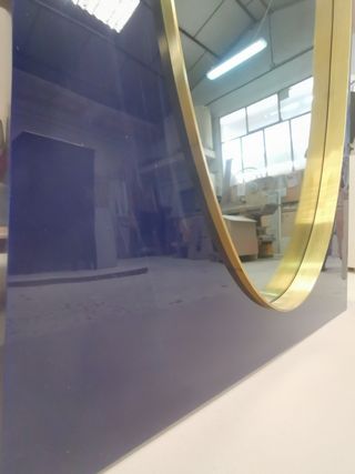 Espejo Art Decó azul y dorado