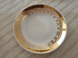 Juego dorado de 2 tacitas vintage de café