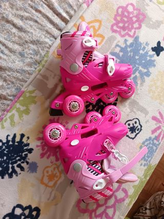 Patines infantiles rosa talla 31-34