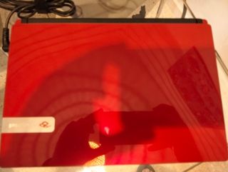 Portátil Packard Bell 11" rojo.  SIN BATERIA