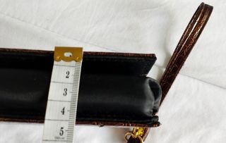 Estuche neceser marrón