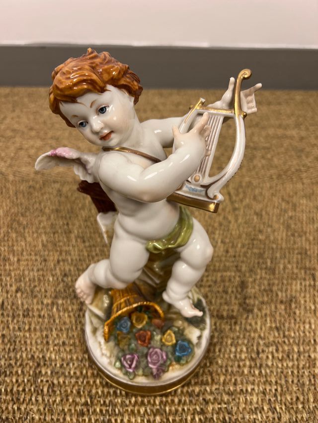 Figura ángel músico porcelana