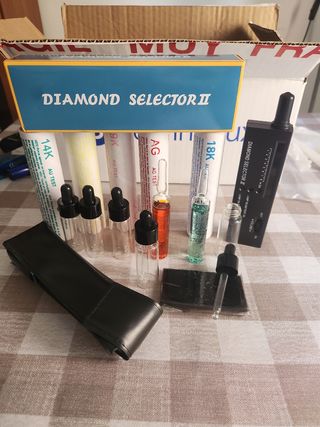 Comprobador Oro plata piedras preciosas.