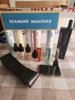 Comprobador Oro plata piedras preciosas.