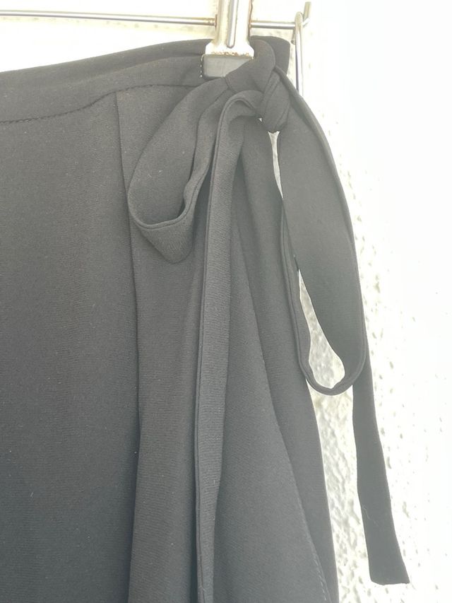 saia preta assimetrica