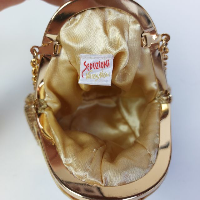 Borsetta oro paillettes, Valeria Marini