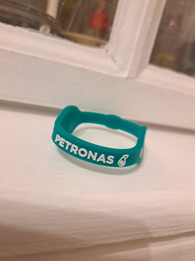 Pulsera Petronas verde-azulada