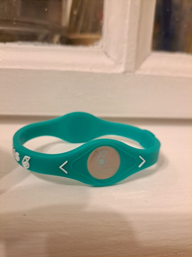 Pulsera Petronas verde-azulada