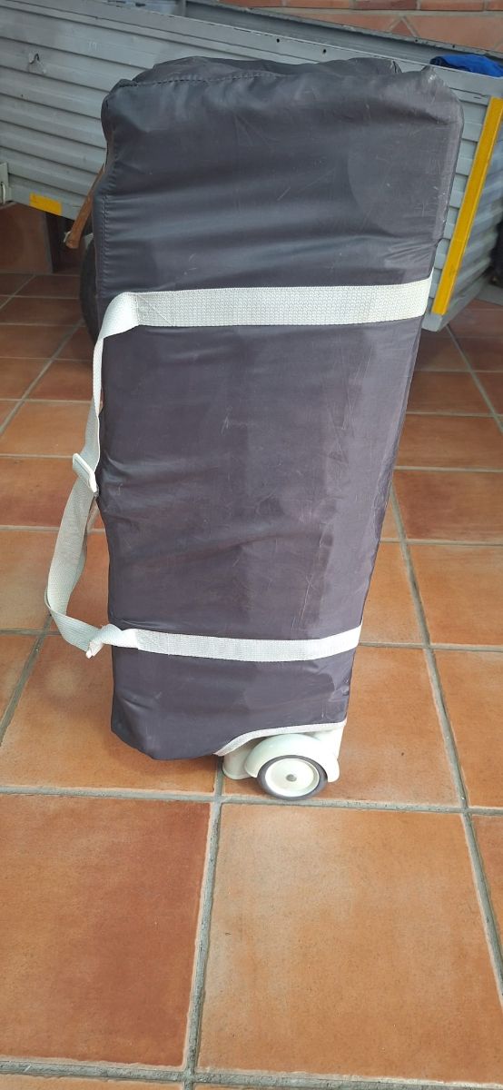 Parque cuna viaje con ruedas