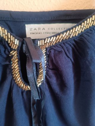 Top Zara azul con detalles dorados