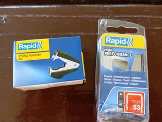 Quitagrapas metálico