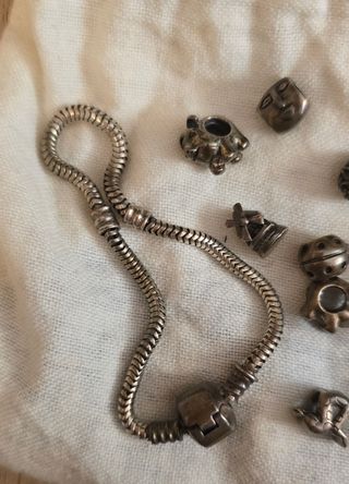 Pulsera 13 charms plata