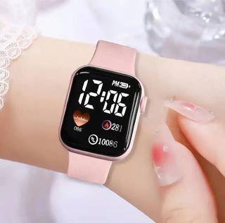 Reloj digital rosa y pulsera corazón rosa