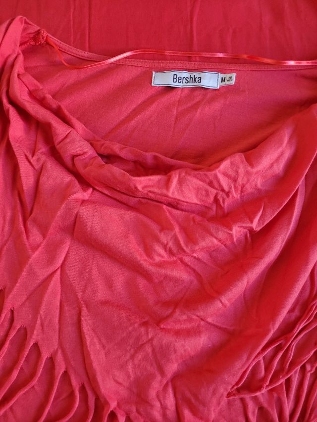 Top rosso lungo con frange