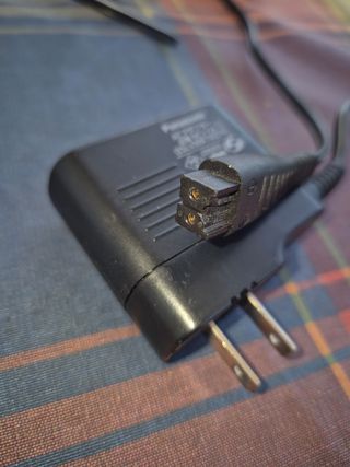 Adaptador Panasonic RC1-74 5,4V para afeitadora.