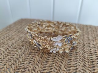 Pulsera flores dorada y plateada
