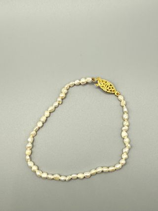 Pulsera perlas-blancas oro