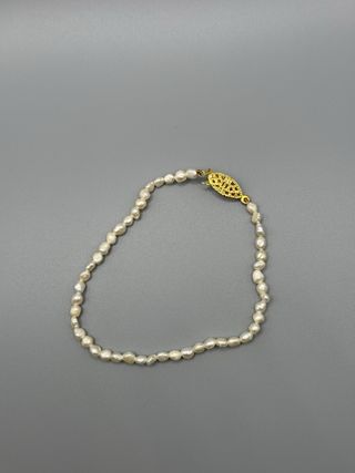 Pulsera perlas-blancas oro