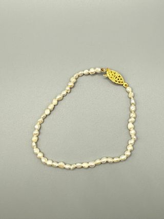 Pulsera perlas-blancas oro