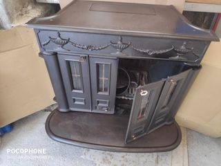 Estufa Hergom antigua de metal para leña