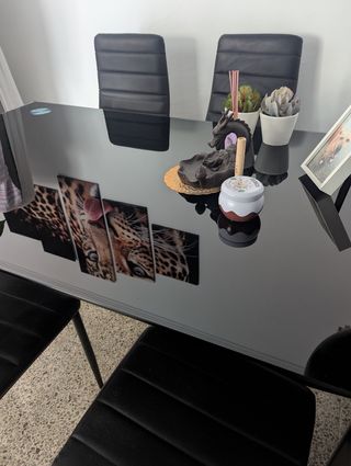 Mesa cristal negra más seis sillas