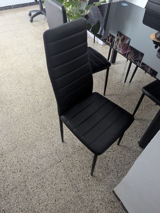 Mesa cristal negra más seis sillas