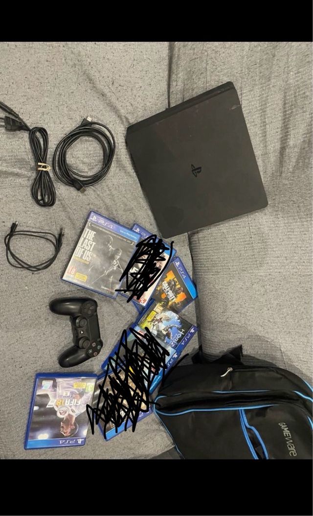 PS4 Slim 1TB + 4 Juegos + mando + mochila