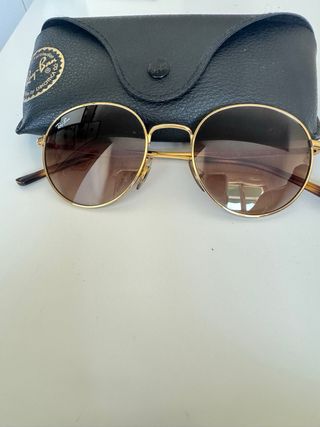 Ray-Ban redondas, doradas