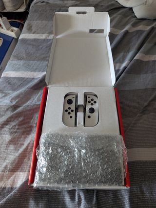 Nintendo Switch OLED blanca + mando + funda