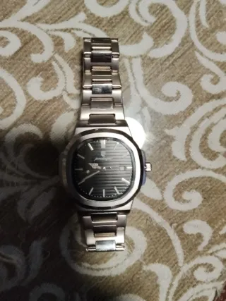 Reloj poedagar 12plateado nuevo