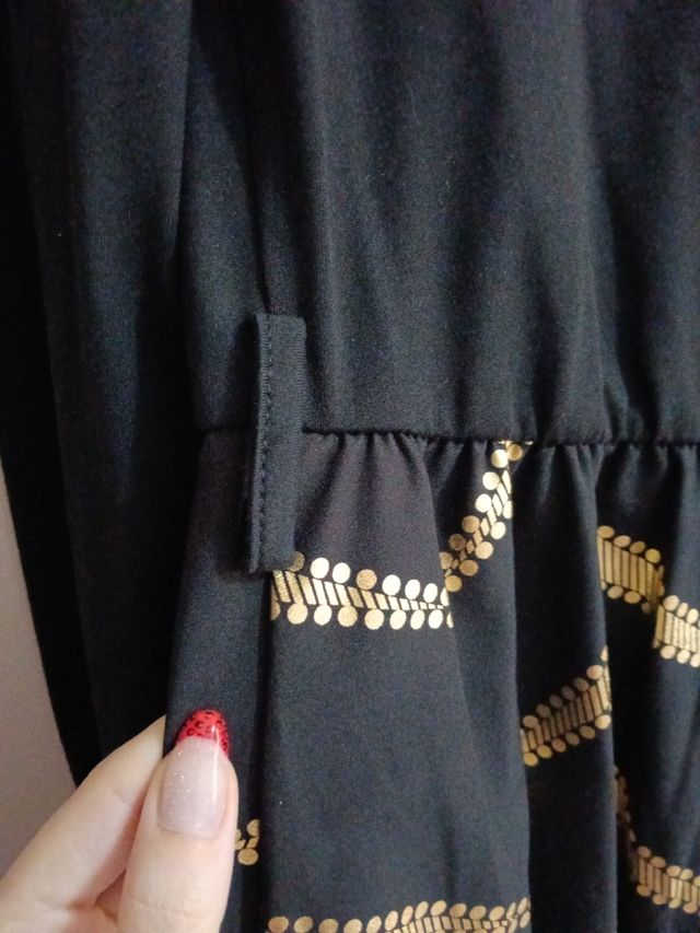 Vestido negro y dorado manga larga